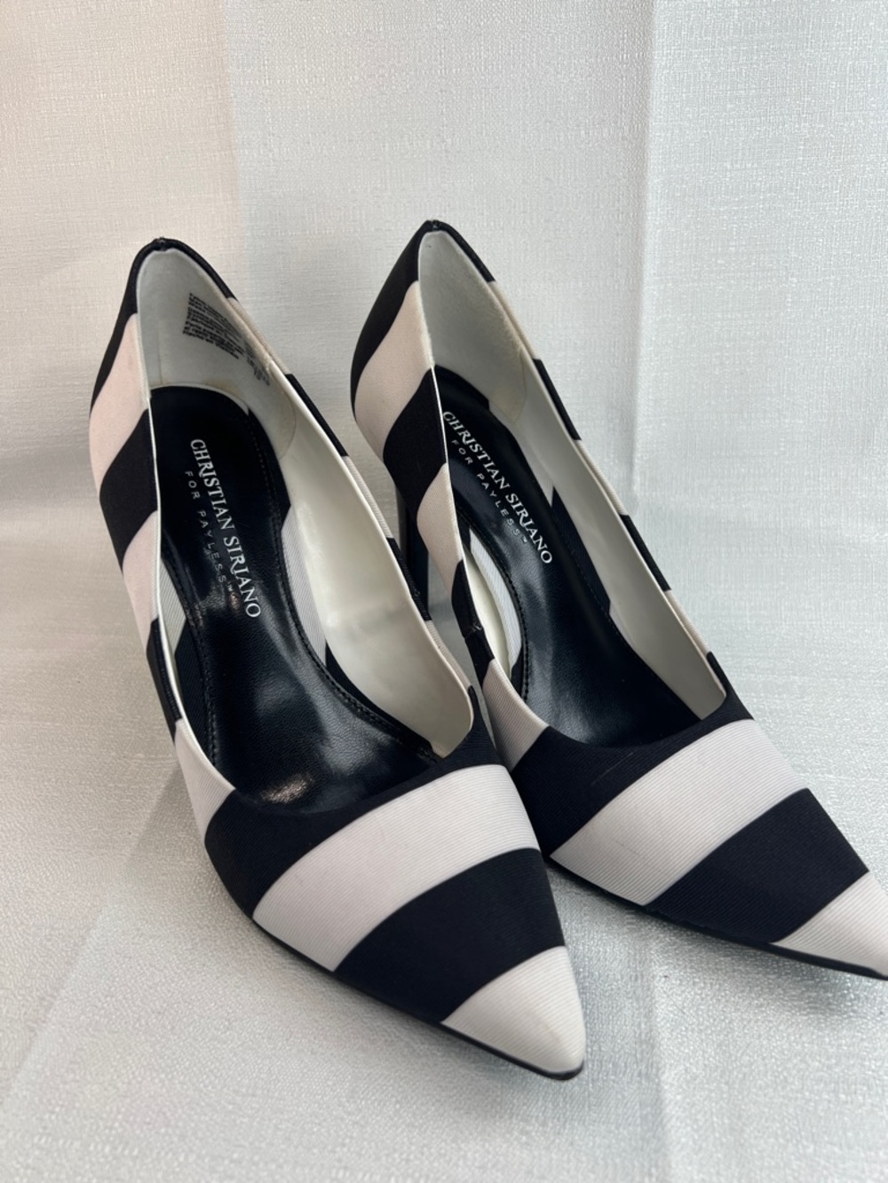 Christian Siraino, black and white striped heels